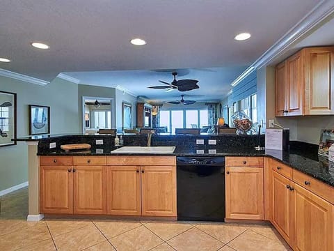 Fully stocked kitchen with all the utensils and home wares needed to cook.