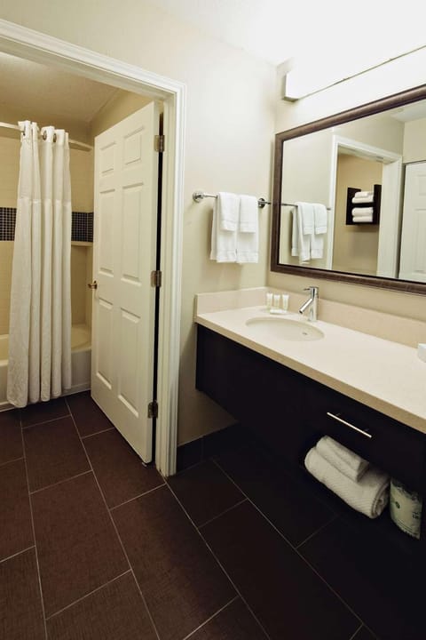 Refresh each morning with bright vanity and plush towels.