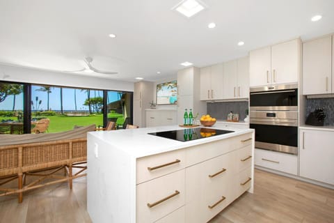 Every cabinet whispers secrets of minimalism and mangoes, in a palette as breezy as a beachside sunrise   