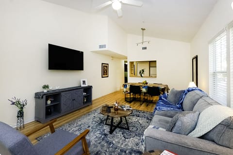 Great room with 58in Roku with ESPN+ and Paramount+ subscriptions and pull out queen sofa bed.