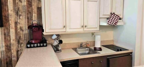 Ye Kitchen is fully equipped with Stovetop Airfryer, stocked Keurig, Microwave and more..