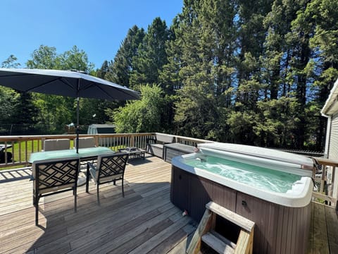 Backyard / deck / fenced in yard / hot tub