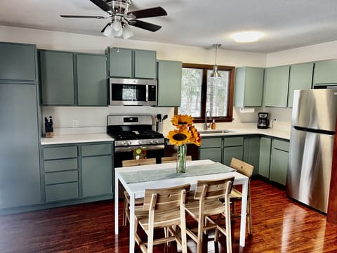 Remodeled and well appointed kitchen. New appliances. Table expands for up to 8.