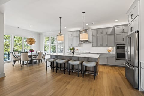 Kitchen and Dining with room for 10 at the table and 4 at the counter.