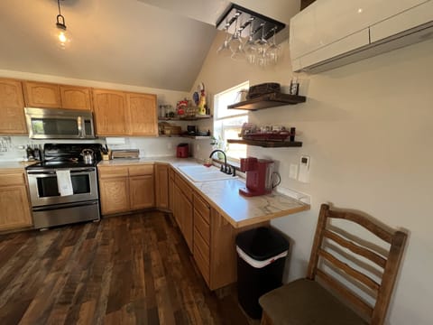 Kitchen is fully stocked with coffee and teas for morning start.
