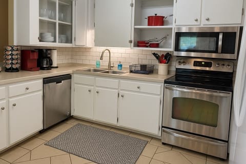 This beautiful home features a fully equipped kitchen. 