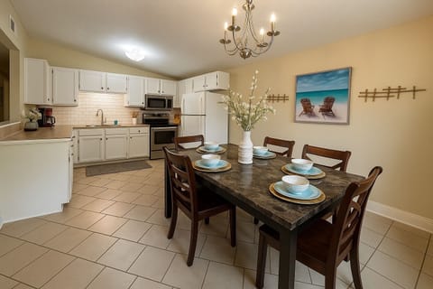 This beautiful home features a fully equipped kitchen. 