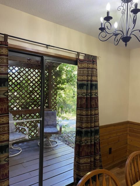 View Of Downstairs Back Porch Covered Seating Area