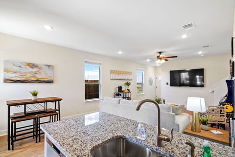 Open concept kitchen with nightlines throughout.