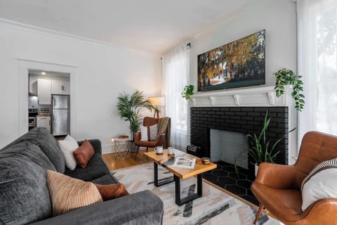 Whether you're sipping morning coffee by the fireplace or curling up on the oversized sofa for a movie marathon, this living area offers a sophisticated yet relaxed atmosphere that feels like a luxury retreat.