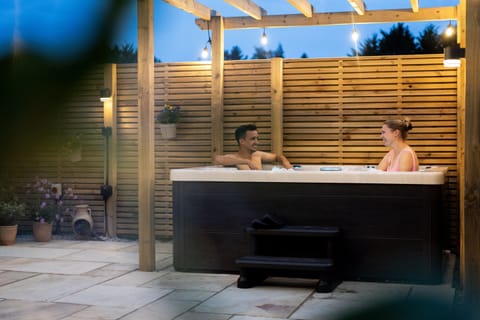 Pergola lit hot tub