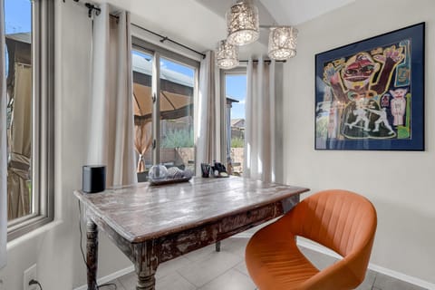 Kitchen nook workspace with backyard views—productive & peaceful for remote work