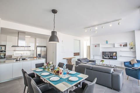 Open-plan ground floor living room, kitchen and dining area