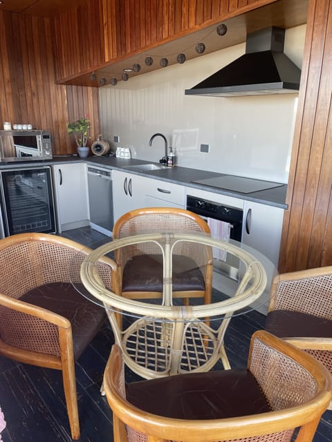 Outdoor/indoor full kitchen with wildfire