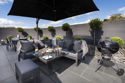 Private outside area with seperate dining area, built in Log Burner & BBQ.