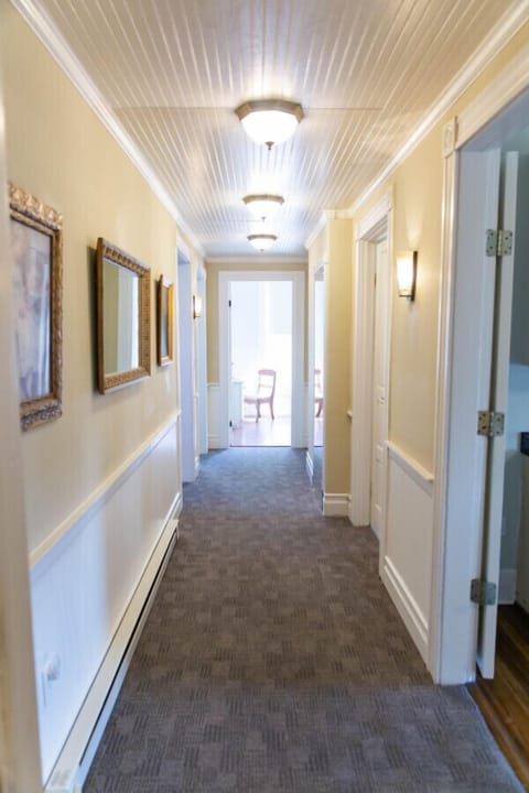 Your view as you walk into the apartment. Going from left to right, the master bedroom with ensuite bathroom, the living room, the 2nd bedroom and the kitchen.