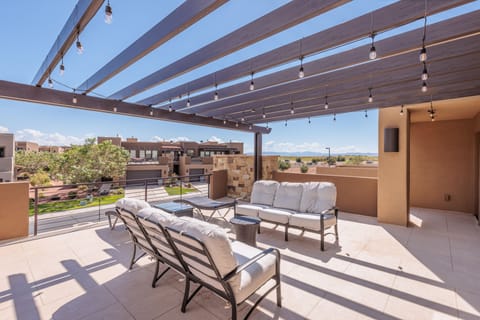 Balcony Patio Seating - Read a book and enjoy the weather while you lounge around in the comfort on the upstairs patio area.