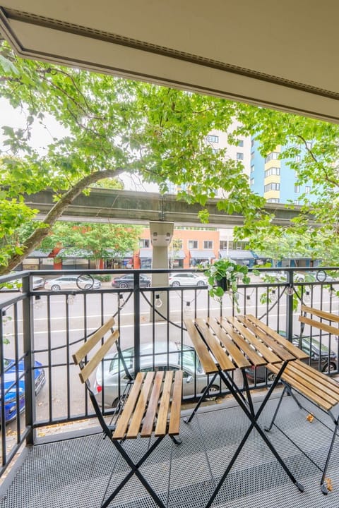 Step outside your private balcony with a view of the monorail gliding past.