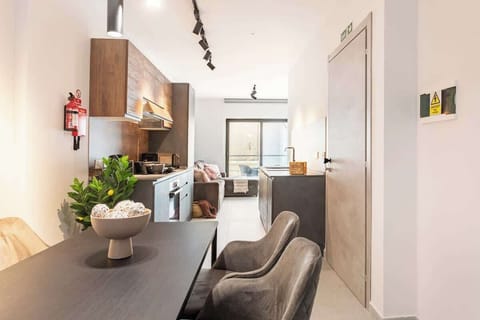The Dining/ Kitchen and Living room - From shared meals to quiet evenings. Our thoughtfully designed living and dining area caters to every mood and moment