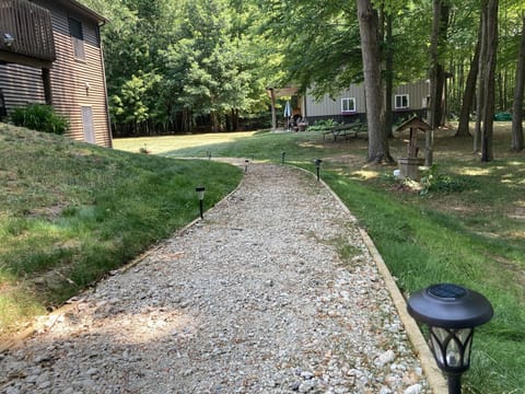 Walk path that ambles to the private entrance at the rear of the house.