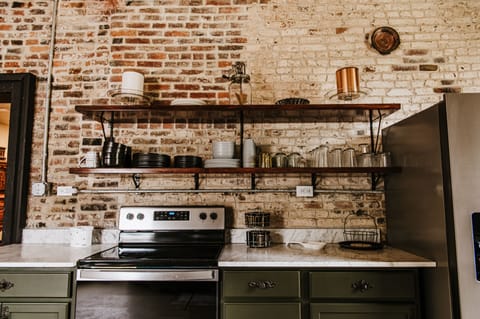 Fully stocked kitchen with glass and plastic ware. Children's plastic ware also