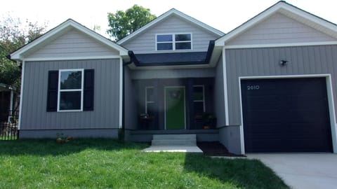 Front of House. The garage is 20' long with a 110 outlet to charge an Elec car.