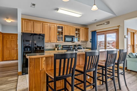 Spacious kitchen, fully stocked with utensils and kitchenware