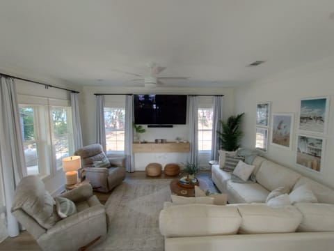 Living area with 75" Smart TV and DVD Player