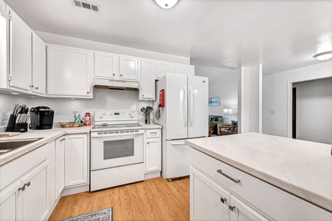 Fully-equipped kitchen with full-size appliances and large island
