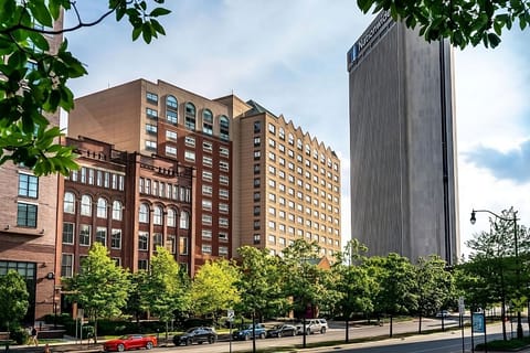 Explore the vibrant district with walkable streets and greenery.
