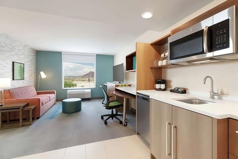Enjoy easy meals with sink, microwave, and convenient kitchenette.