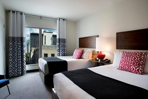 Settle into crisp double queens after a day downtown.