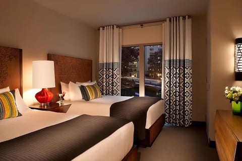 Rest easy in a softly lit room designed for two.