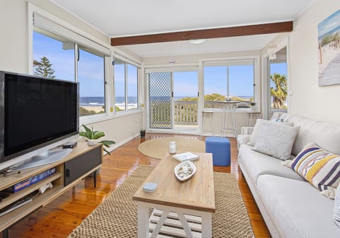 Living room - sun filled, bright & airy with beach views, whilst relaxing.