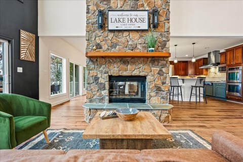 Enjoy the floor to ceiling rock fireplace. Wood burning for chilly evenings on the lake.