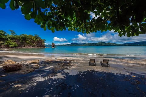 Secluded black sand beach