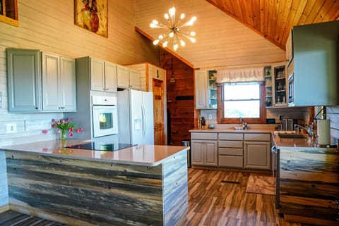 Full kitchen with all appliances, dishes, utensils, pots and pans.