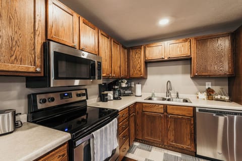 Updated & stocked with standard kitchen & cooking supplies. Seating for 6.