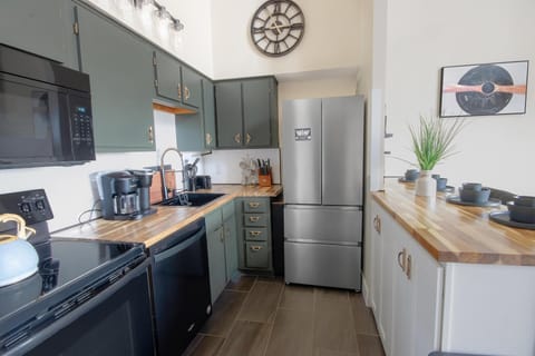 Cook with ease in the fully stocked, high-end kitchen.