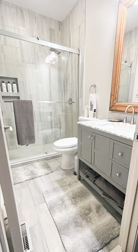 Newly renovated bathroom with rain shower