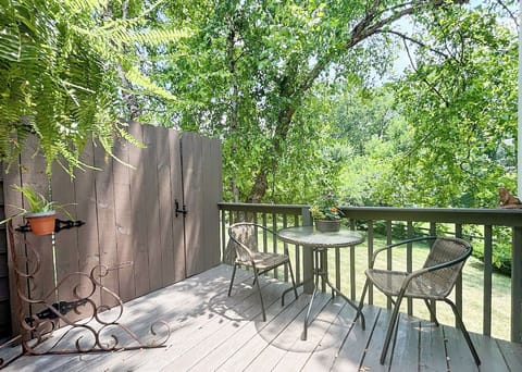 Private deck overlooking meandering creek.
