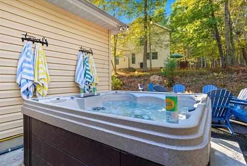 Unwind in the private hot tub after a day of hiking, skiing, or lake adventures. - The Pasquin - East Stroudsburg, PA
