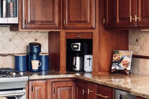 The kitchen is stocked with everything you'll need...including drip coffee makers of course!