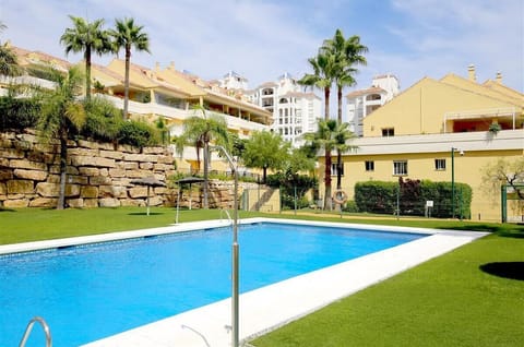 View of one of the two communal swimming pools in this complex