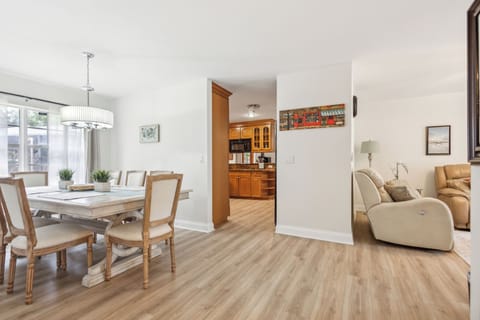 dining room with kitchen entrance