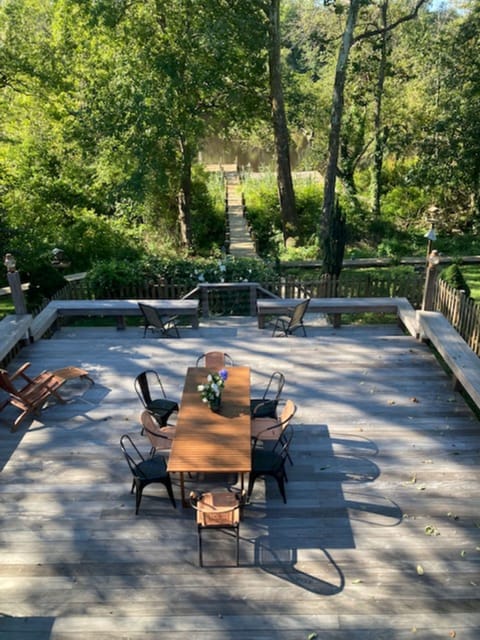 Large deck off the back of the house with lots of seating, beautiful views.
