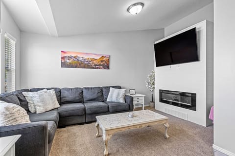 Living room with heated fireplace