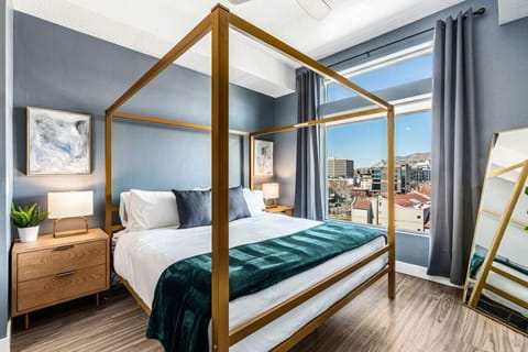 Top floor! Spacious living room with views of the Capital and mountains, 65` Roku tv and comfortable couch!