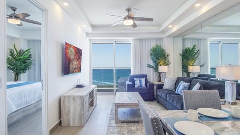 The living room with its access to the patio through sliding glass doors.