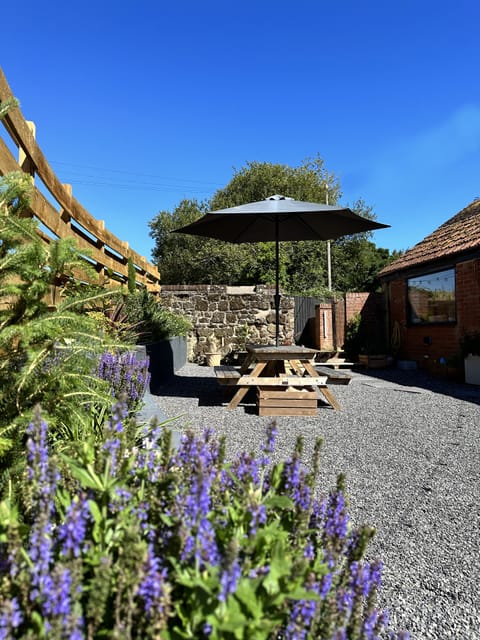Pretty South Facing Courtyard with Seating for 4.